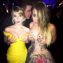Melissa Rauch And Kaley Cuoco Holding Their Breasts